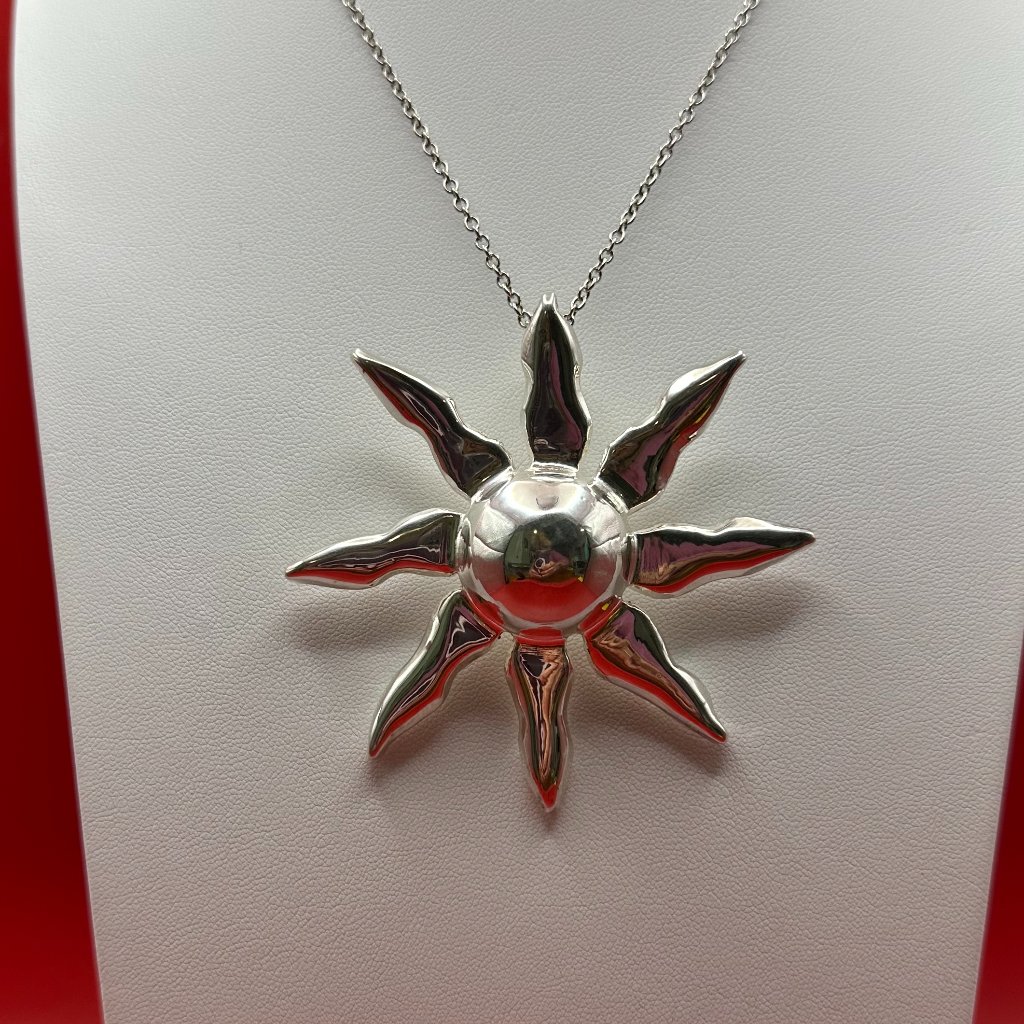 Stunning Large Silver-Tone Sunburst Pendant.